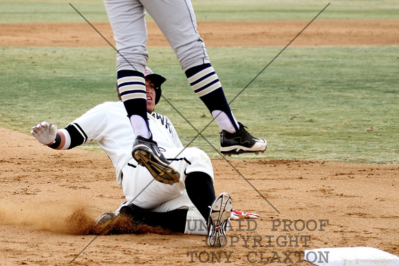 Jose Favela Sliding Safely Into Third