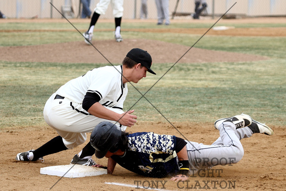 Matthew Holcombe Tagging The Runner At First