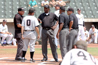 Head Coach Britt Smith Talking With The Umpires Before The Game