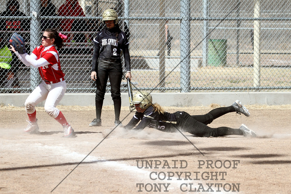 Makenzie Roberts Sliding Safely Into Home Plate