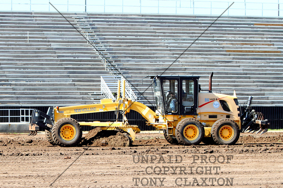 Grader Removing Soil