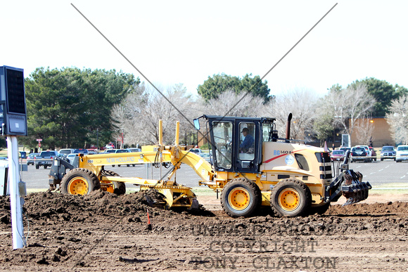 Grader Removing Soil