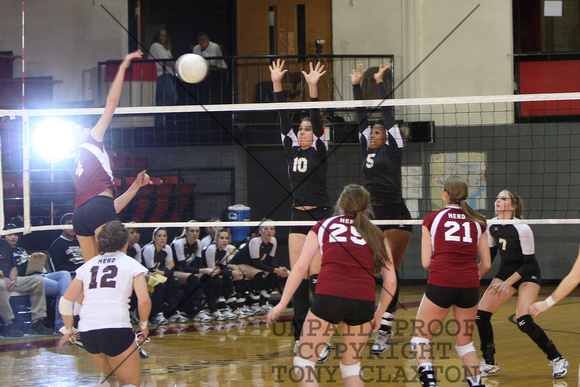 Halee and Desiree Blocking With Cerbi Backing Them Up And The Hereford Hitter's Head Exploding