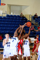 DeAndra Thomas With A Rebound With Patricia Malouff Running Downcourt
