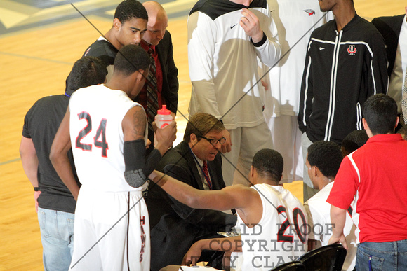 Coach Mark Adams Talking To His Team During A Time Out