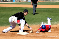 Levi Scott Tags Out A Base Runner At First On A Pickoff Throw From Pitcher Kyle McLeroy