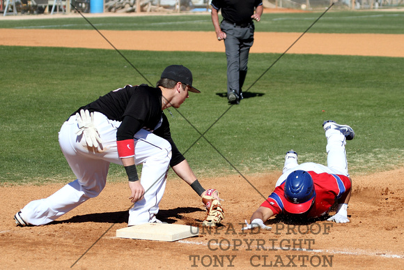 Levi Scott Tags Out A Base Runner At First On A Pickoff Throw From Pitcher Kyle McLeroy