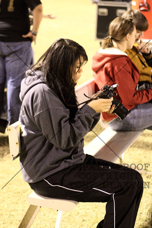 Journalism Student Checking Her Camera