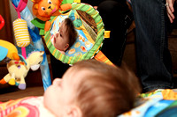 Reflection Of Anabelle Looking At Her Toy