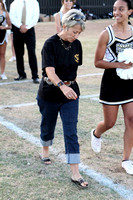 Former Cheerleader Being Escorted To The Victory Line By A JV Cheerleader