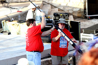 Bill Norris And Dale Ferguson Loading The T-Shirt Cannon