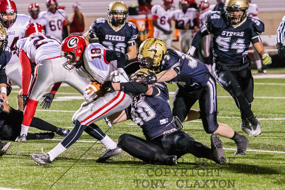Alex Johnson And Garrett Wigington Tackling