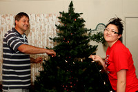 Tony And Andrea Putting Lights On The Tree