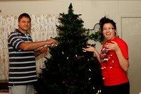 Tony And Andrea Putting Lights On The Tree