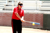 Coach Kelly Raines Hitting Infield Practice
