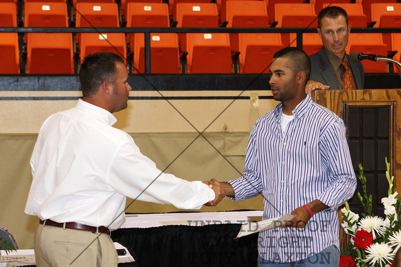B.J. Armstrong Receiving A Certificate From Coach Thomas