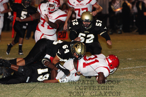 Xavian And Anthony Tackling The Ball Carrier