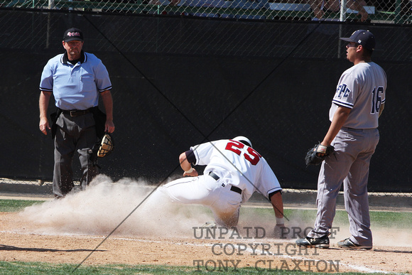 Miles Hamblin Slides In Safe At Home After A Passed Ball