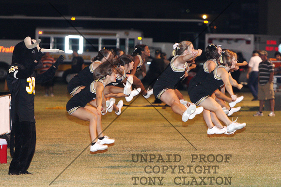 Cheerleaders Jumping During The Game