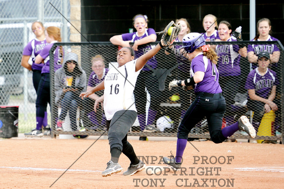 Mercedes Ruiz Catching A Throw At First For An Out