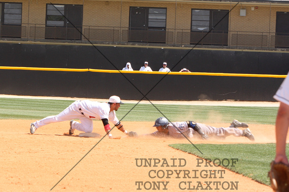 Andrew Collazo Tags Out The Base Runner At Second