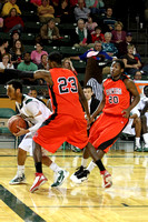 Shavon Coleman And Tramel White Guarding The Ball Handler