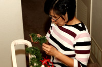 Brenda Working On The Garland On The Stairs