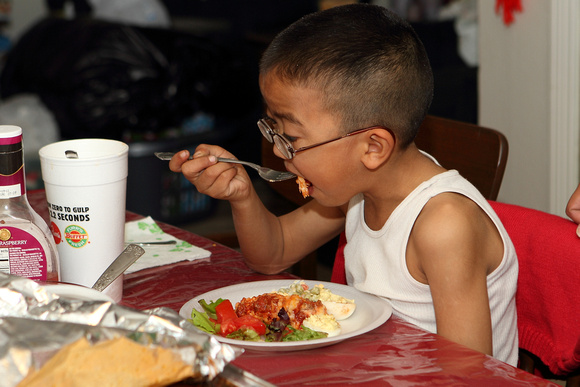 Julian Eating Lasagna