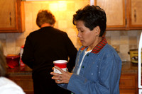 Brenda Drinking In Kitchen Before Ornament Exchange