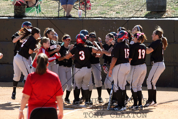 Team Congratulating Olive Naotala For Her Home Run
