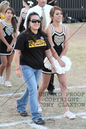 Former Cheerleader Being Escorted To The Victory Line By A JV Cheerleader