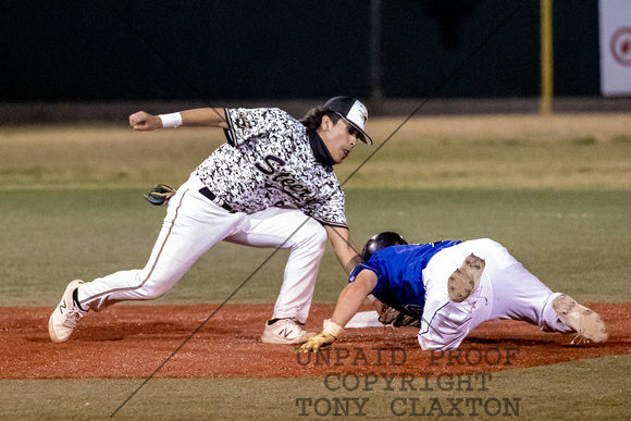 Joshua Miramontes Tagging A Base Runner Out At Second Base