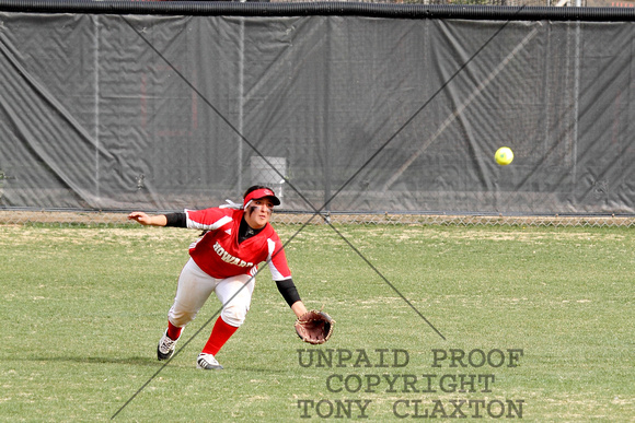 Priscilla Harris Running For A Catch In Right Field