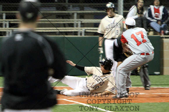 Gunnar Sliding Into Home On A Passed Ball
