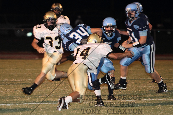 Dennis Tackling The Ball Carrier