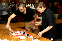 Coaches Jeff Mailhot And Mark Adams Cutting The Cake