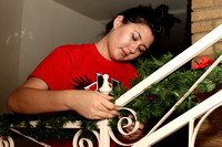 Andrea Putting The Garland On The Stairs